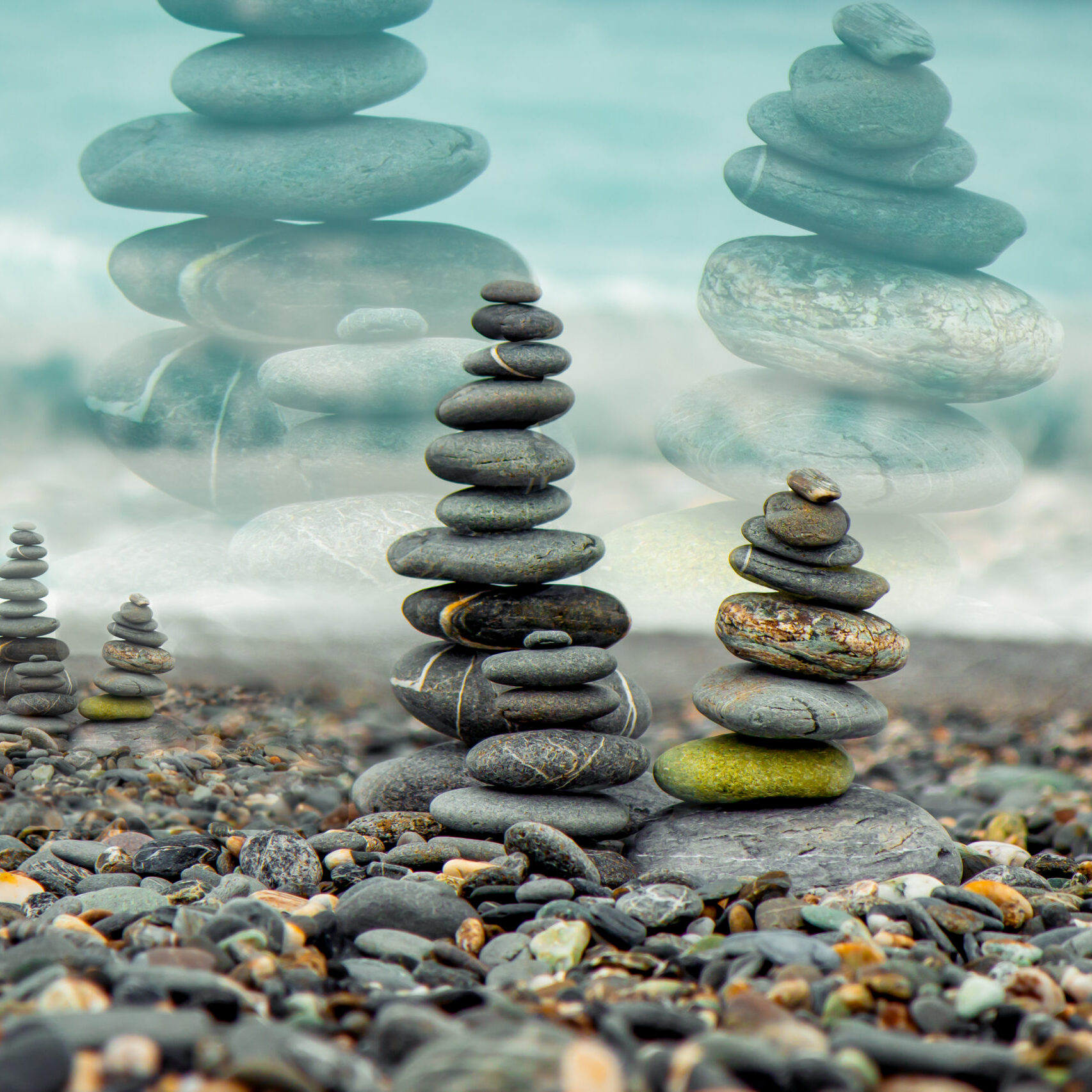 A pile of rocks sitting on top of a beach.